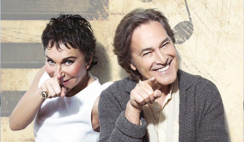 Ricchi e Poveri davanti a un muro