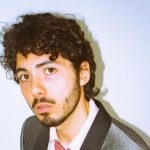 Fulminacci in giacca e cravatta