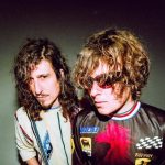 Officina della Camomilla con sfondo verde