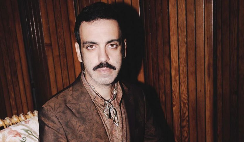 colapesce con dietro del legno