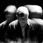 Beppe Carletti su sfondo nero