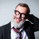 Marco Masini con sfondo grigio